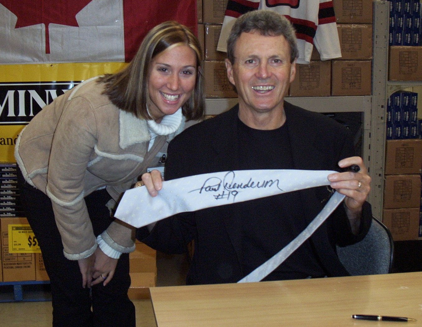 Tiffany Lytle of the Food Bank with Paul Henderson Signing Tie - 2002